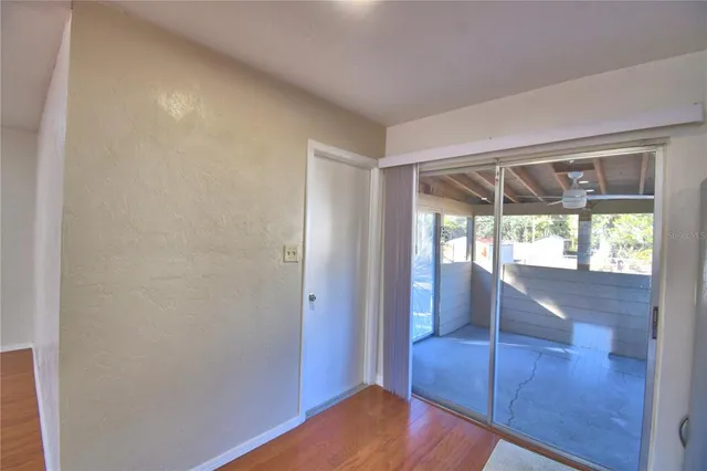 a view of entryway with wooden floor