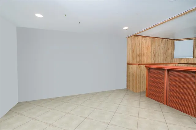 an empty room with cabinet