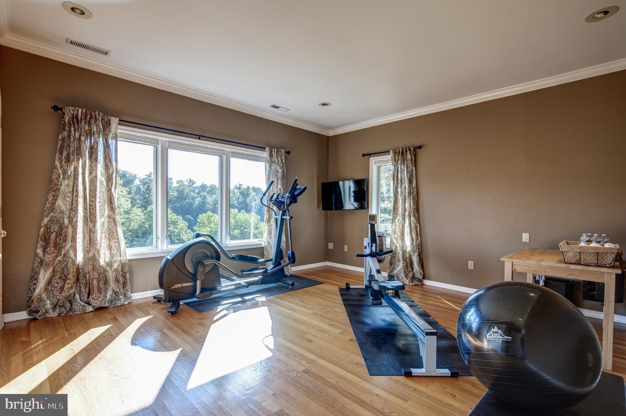 242 Ravenscliff Road Wayne, PA 19087 - Photo 30 of 49 a view of a livingroom with workspace and a window