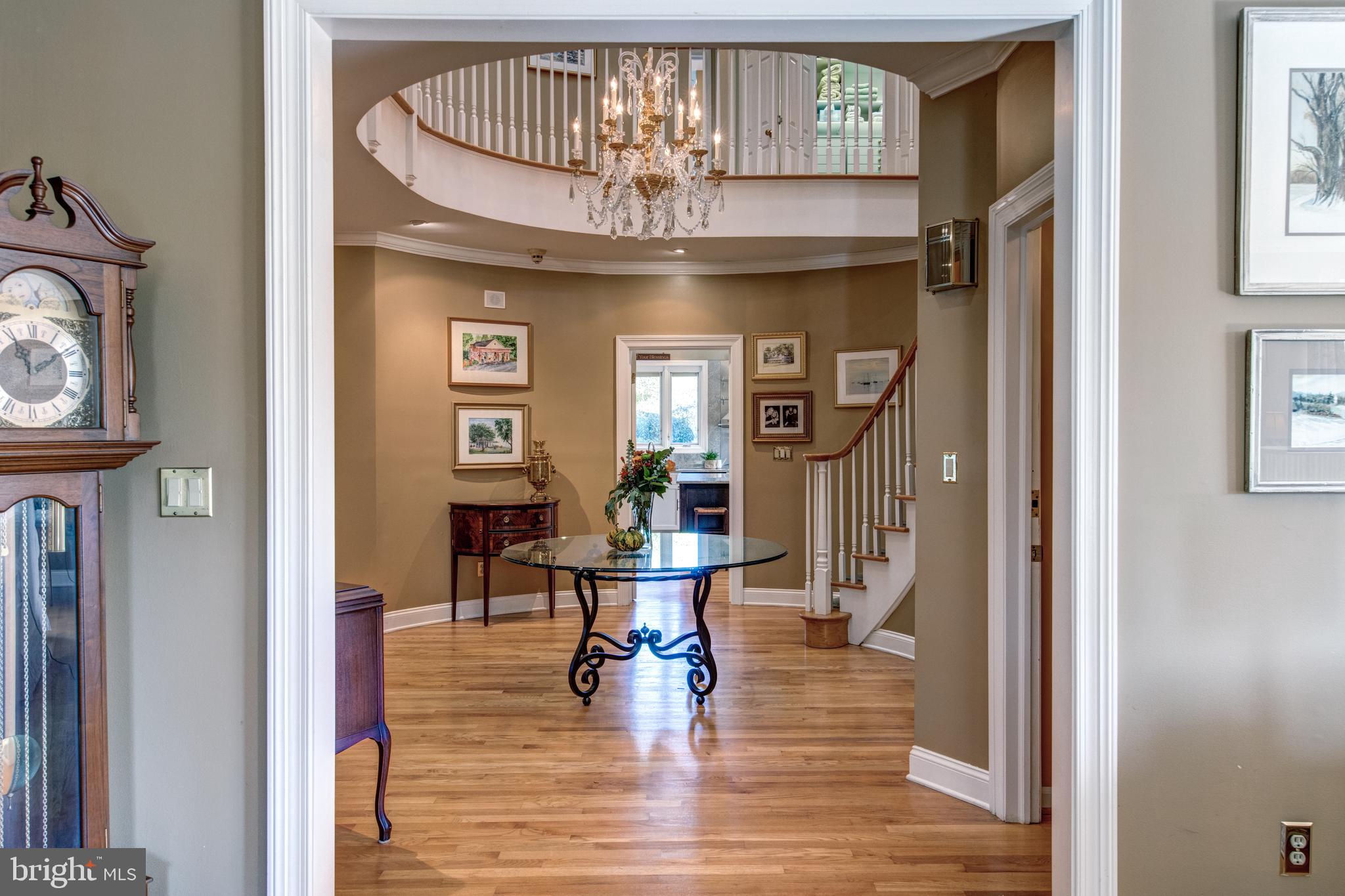 242 Ravenscliff Road Wayne, PA 19087 - Photo 4 of 49 a view of entryway livingroom and hall with wooden floor