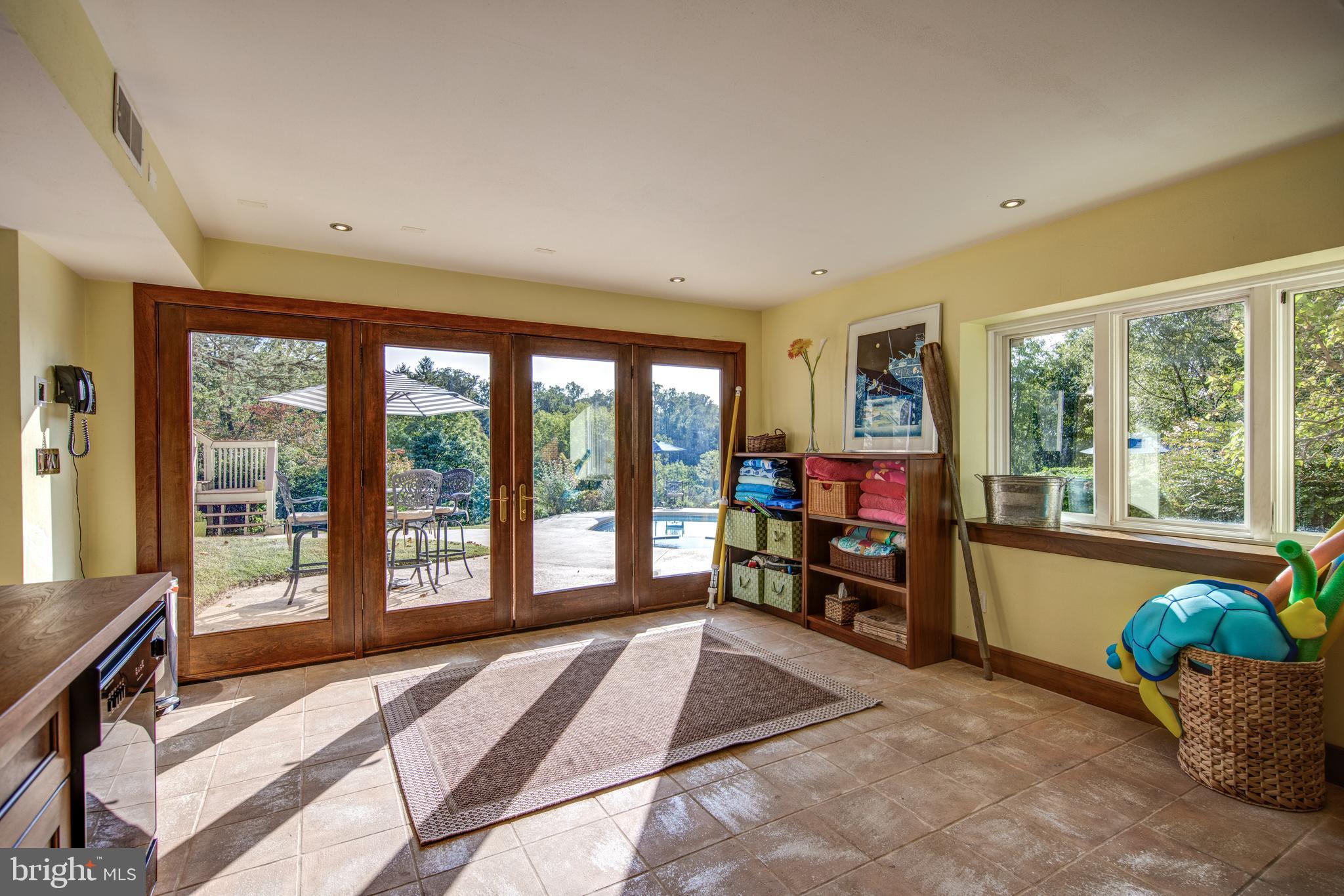 242 Ravenscliff Road Wayne, PA 19087 - Photo 43 of 49 a living room filled with furniture and a large window