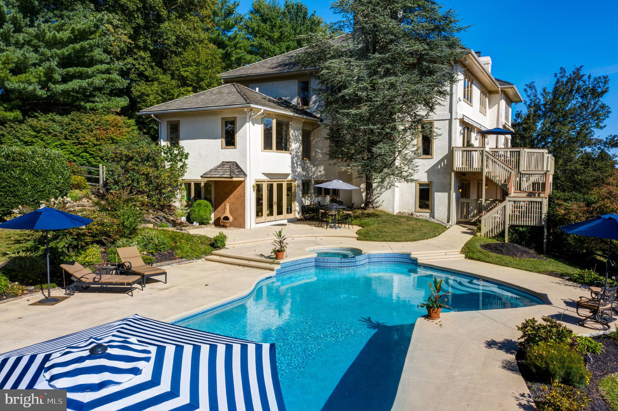 242 Ravenscliff Road Wayne, PA 19087 - Photo 44 of 49 a view of a house with pool and sitting area