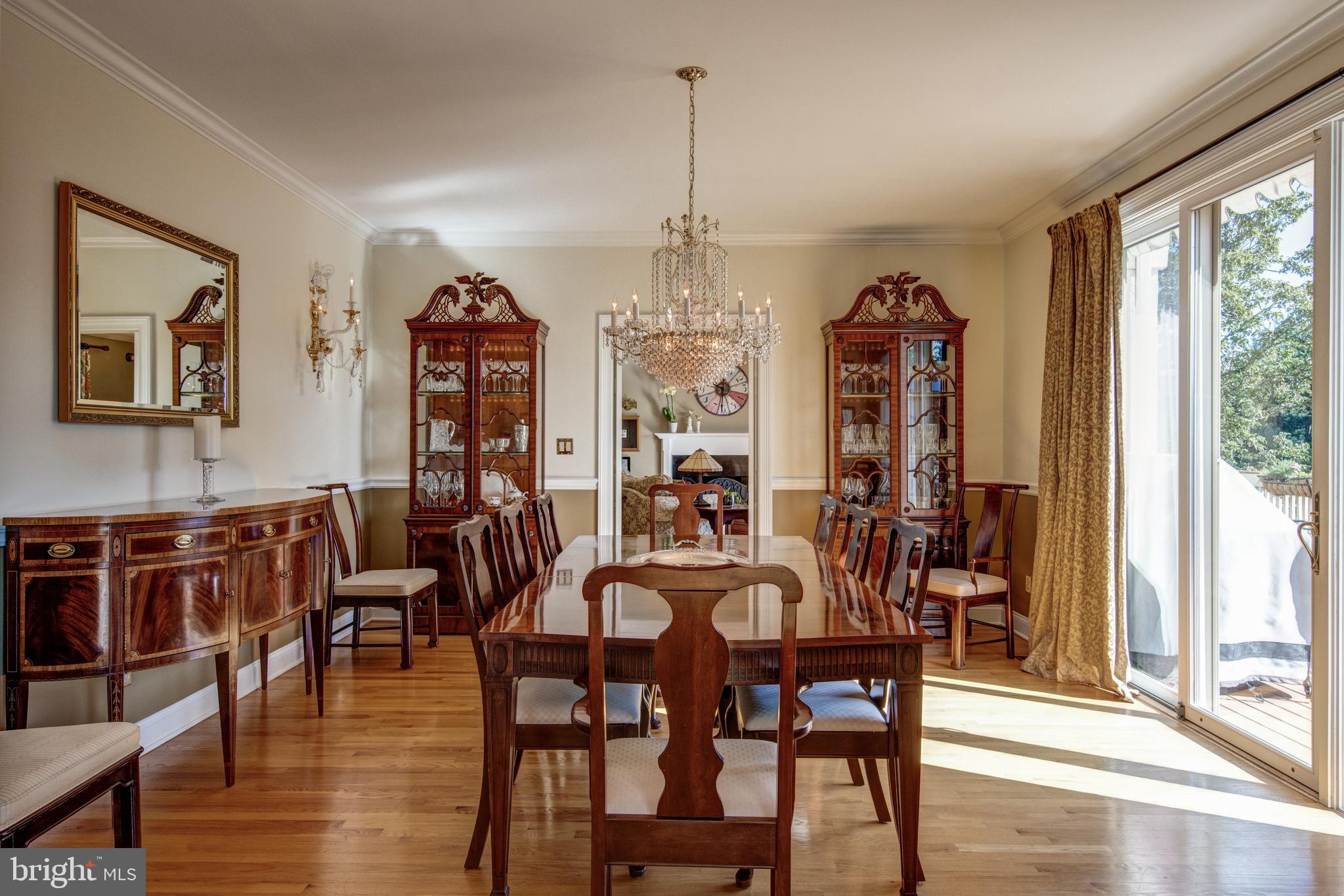 242 Ravenscliff Road Wayne, PA 19087 - Photo 7 of 49 a view of a dining room with furniture window and wooden floor