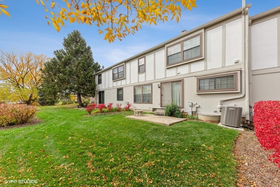 4539 Opal Drive Hoffman Estates, IL 60192 - Photo 22 of 27 a view of a house with backyard and sitting area