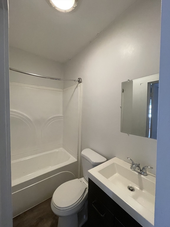 5 Freeland Terrace, Unit 3 Worcester, MA 01603 - Photo 22 of 25 a bathroom with a sink toilet and shower