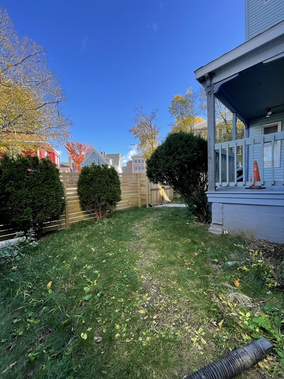 5 Freeland Terrace, Unit 3 Worcester, MA 01603 - Photo 5 of 25 a view of a chair and table in the garden
