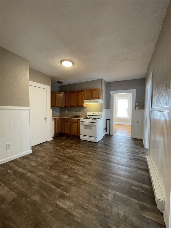 5 Freeland Terrace, Unit 3 Worcester, MA 01603 - Photo 9 of 25 a view of a kitchen with a sink and a stove top oven