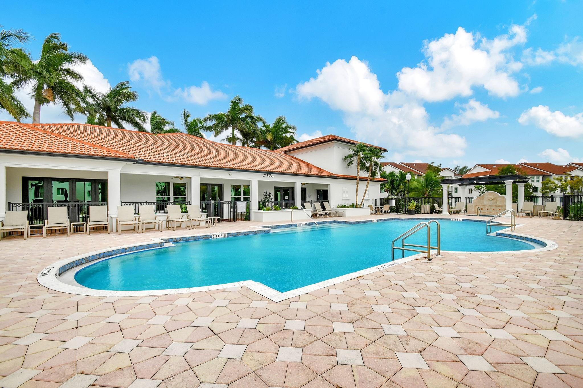 805 Villa Circle Boynton Beach, FL 33435 - Photo 13 of 21 a view of house with swimming pool outdoor seating