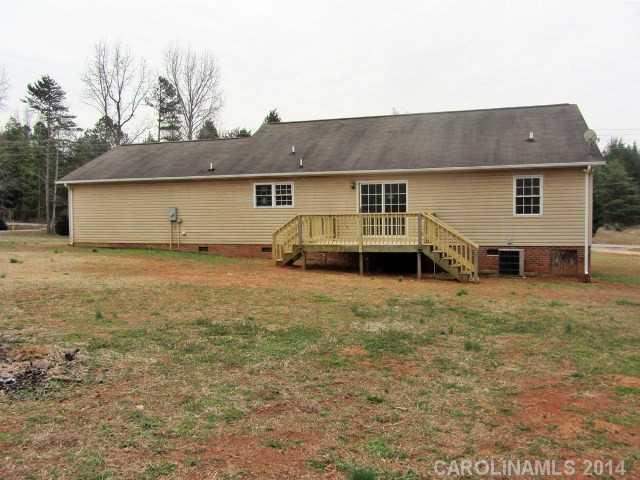 300 Sutton Spring Road York, SC 29745 - Photo 11 of 12 a house that has a lot of windows on it