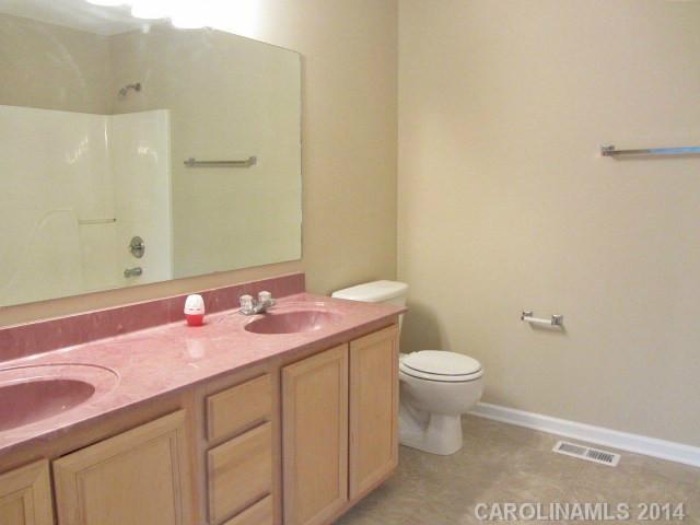 300 Sutton Spring Road York, SC 29745 - Photo 9 of 12 a bathroom with a sink and a toilet