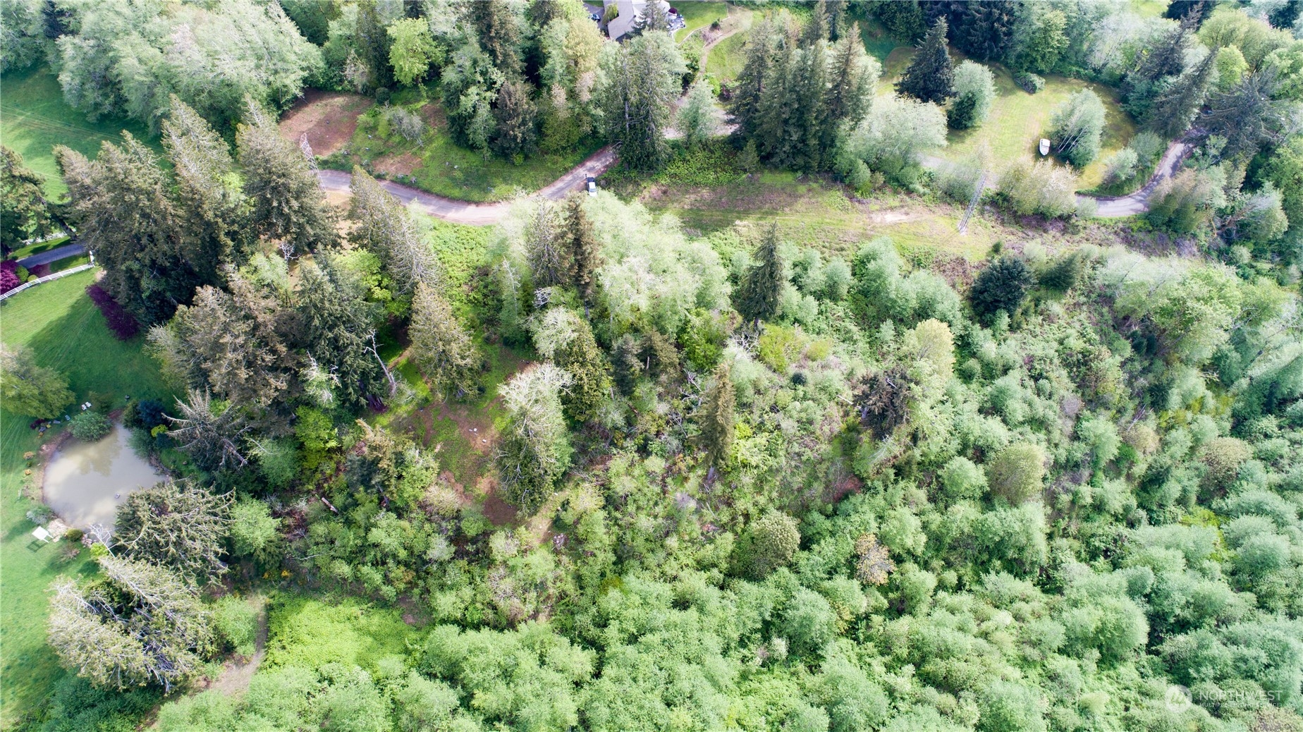 1111 Washington Cemetery Road Raymond, WA 98577 - Photo 22 of 23 an aerial view of residential house with outdoor space and trees all around