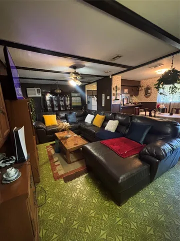 a room with gym equipment and a large window