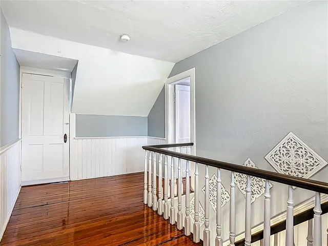 a bathroom with a tub and a window