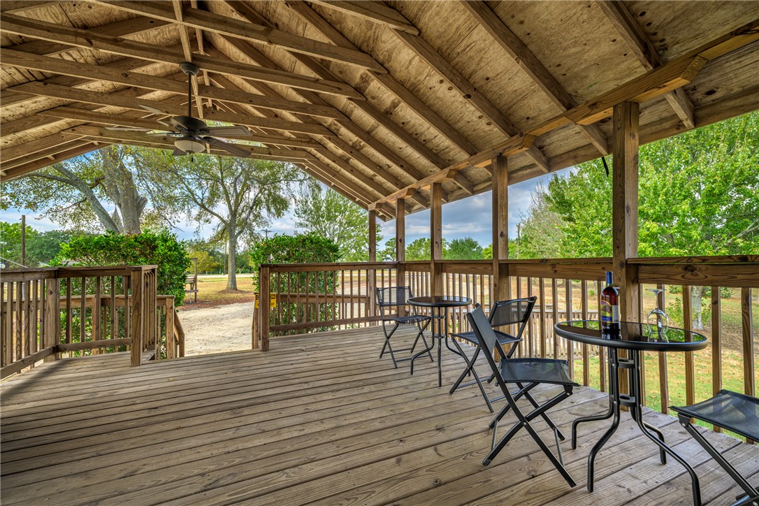 1441 Salem Road Brenham, TX 77833 - Photo 13 of 34 Wooden terrace featuring a ceiling fan