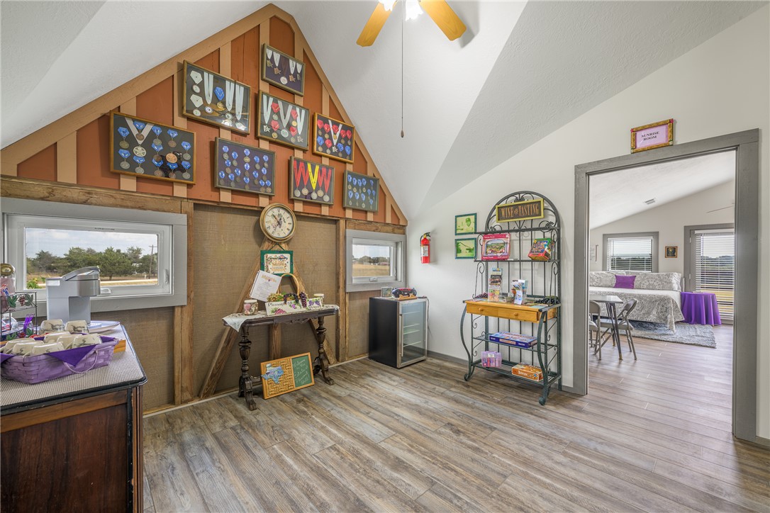 1441 Salem Road Brenham, TX 77833 - Photo 20 of 34 Office space with lofted ceiling, wine cooler, and a ceiling fan