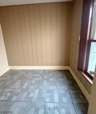 a view of a hallway with a window