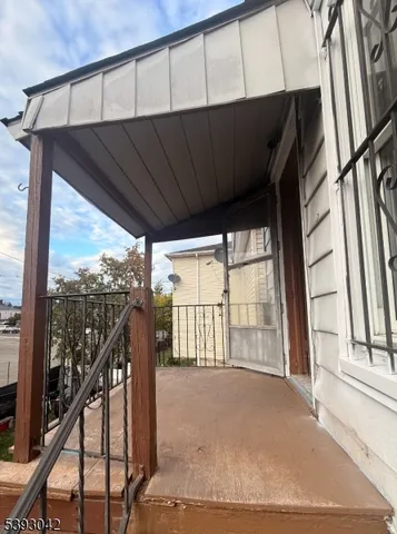 a view of a balcony with an outdoor space