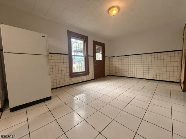 a view of empty room with windows