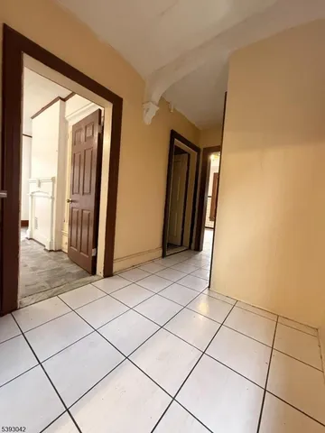 a view of a utility room with windows