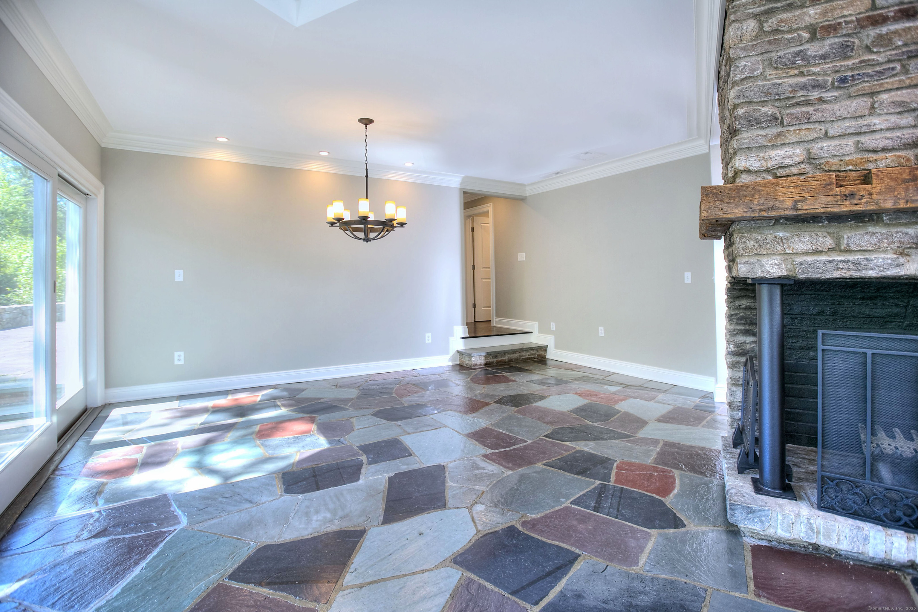 27 Rogues Ridge Road Weston, CT 06883 - Photo 13 of 39 a view of a livingroom with a fireplace