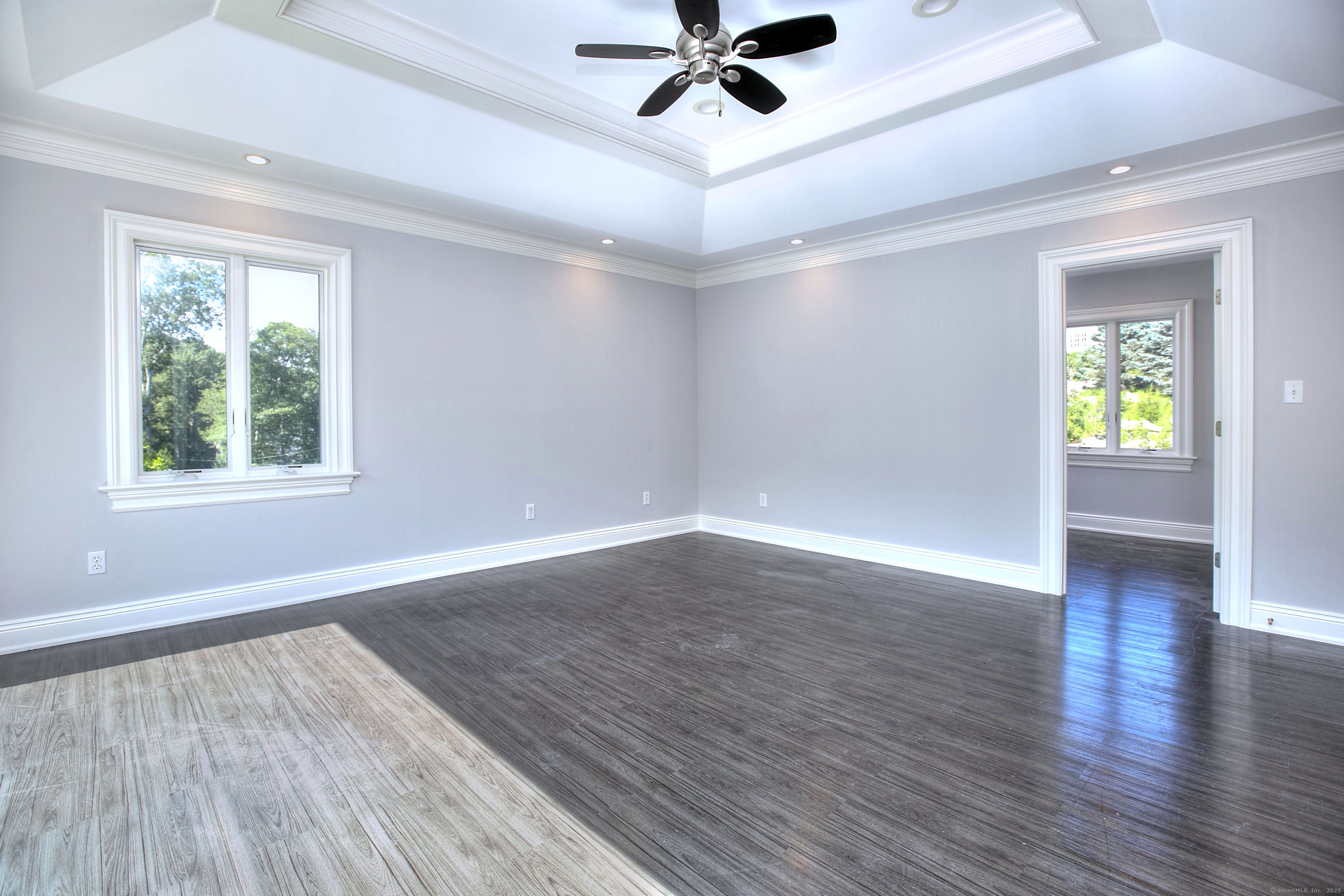 27 Rogues Ridge Road Weston, CT 06883 - Photo 24 of 39 wooden floor in an empty room with a window
