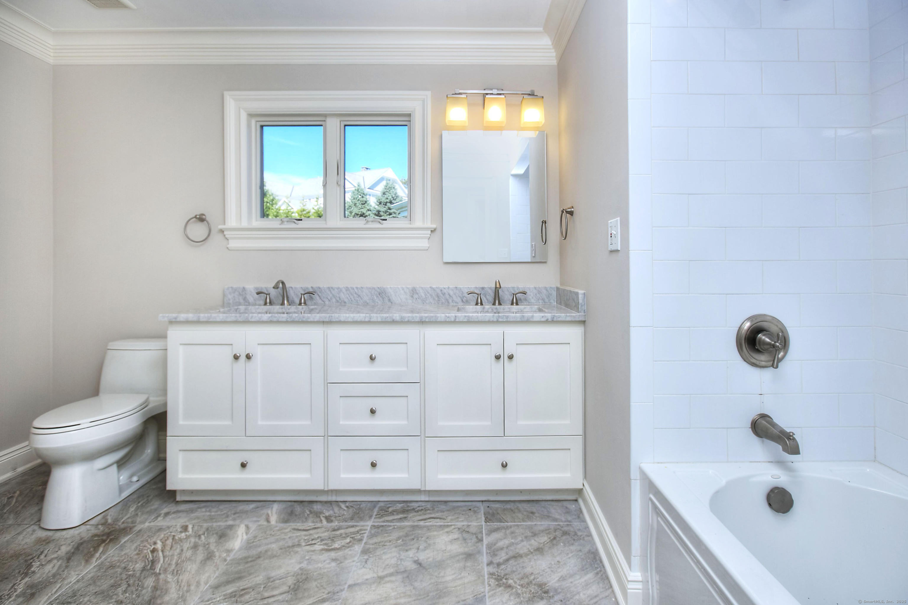 27 Rogues Ridge Road Weston, CT 06883 - Photo 29 of 39 a bathroom with a sink toilet and bathtub