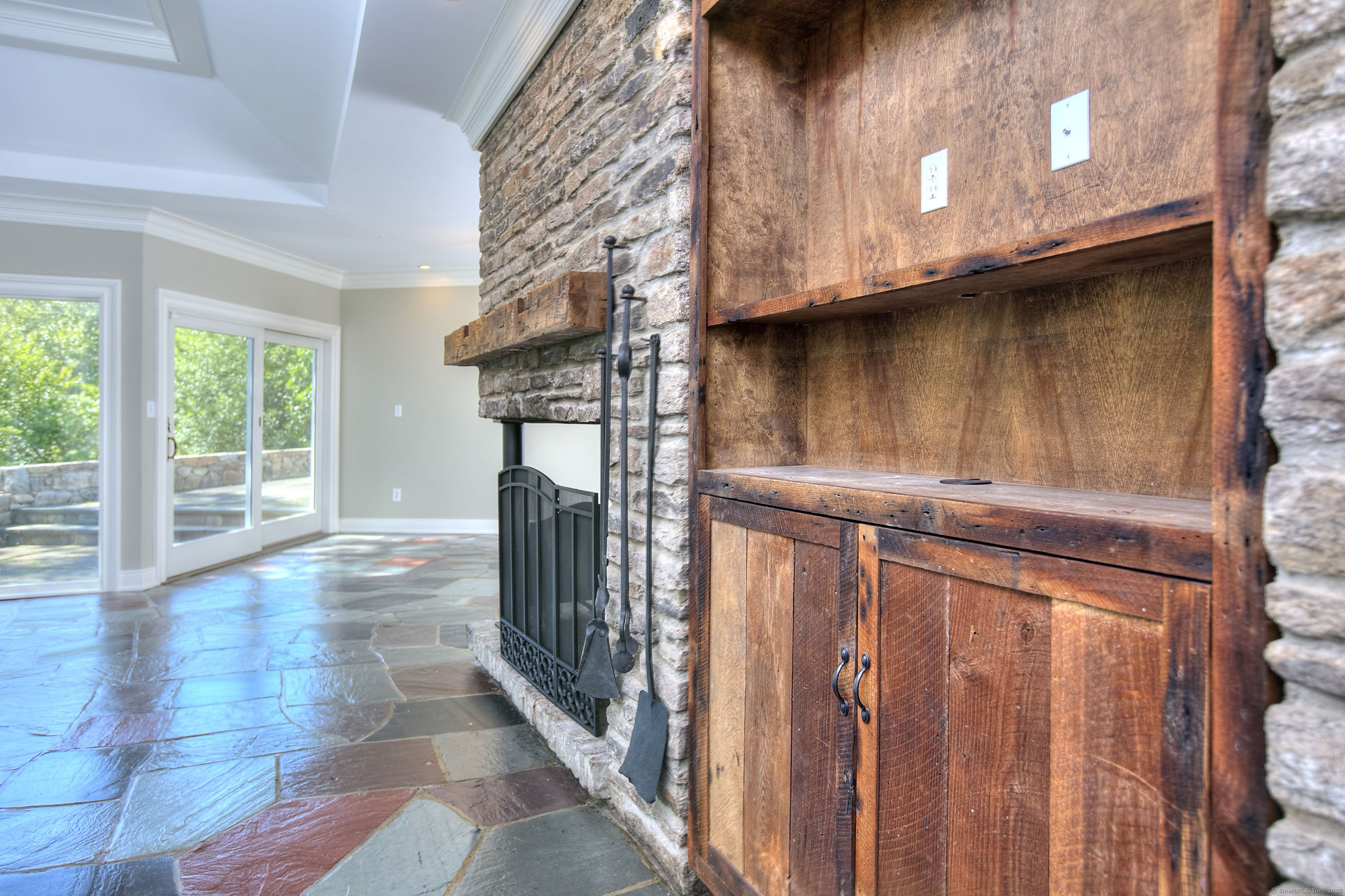 27 Rogues Ridge Road Weston, CT 06883 - Photo 10 of 39 a view of a house with a street