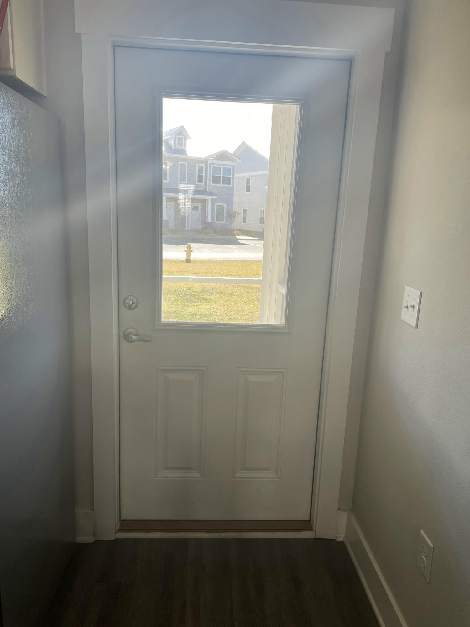 245 North Sand Palm Road Freeport, FL 32439 - Photo 8 of 27 a view of small space with wooden floor and a window