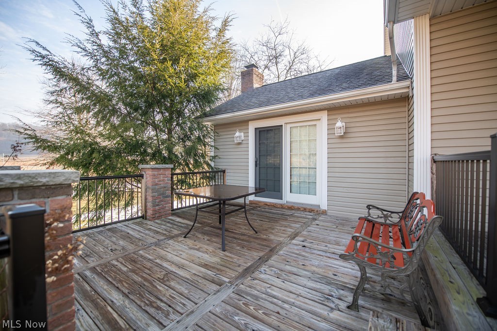 4848 Fette Road Dennison, OH 44621 - Photo 13 of 48 Wooden deck featuring outdoor dining space