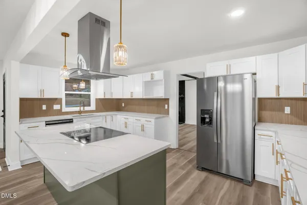 a kitchen with a stove and a sink
