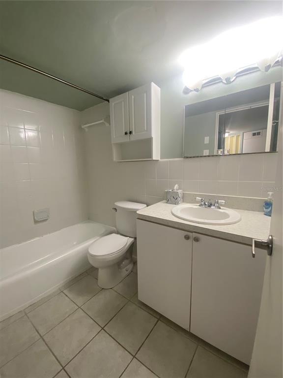 16400 Gulf Boulevard, Unit 707 North Redington Beach, FL 33708 - Photo 11 of 20 a bathroom with a sink a toilet and bathtub