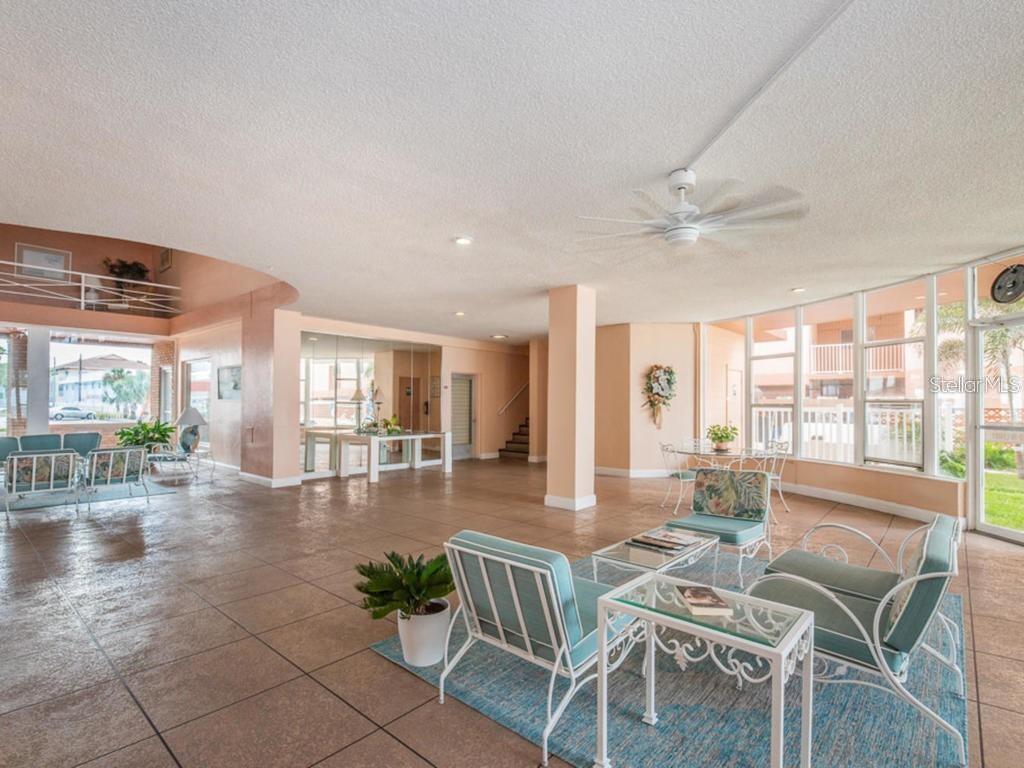 16400 Gulf Boulevard, Unit 707 North Redington Beach, FL 33708 - Photo 15 of 20 a view of a dining room with furniture window and outside view