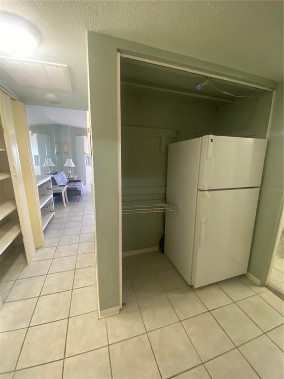 16400 Gulf Boulevard, Unit 707 North Redington Beach, FL 33708 - Photo 10 of 20 a view of a storage & utility room with two washing machine