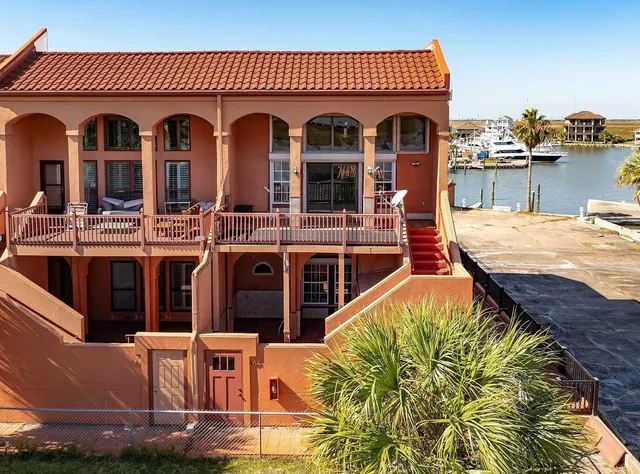 a front view of a house with swimming pool