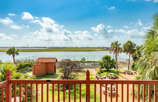 a balcony with an ocean view