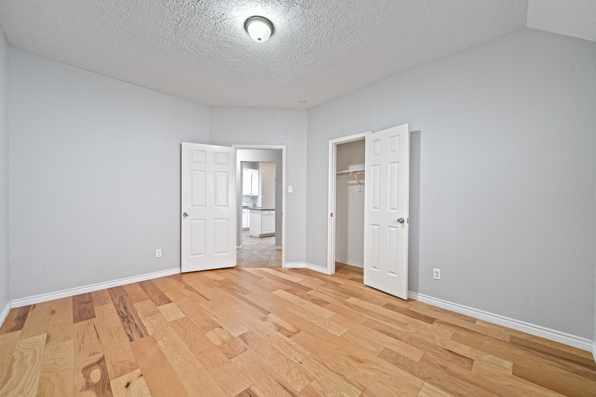 23223 Hazel Field Court Katy, TX 77494 - Photo 11 of 27 a view of empty room with wooden floor