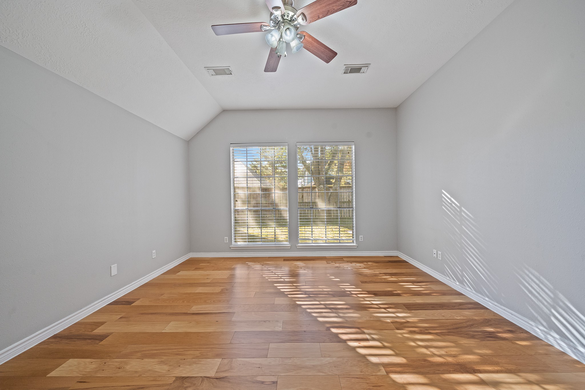 23223 Hazel Field Court Katy, TX 77494 - Photo 20 of 27 a view of an empty room with a window