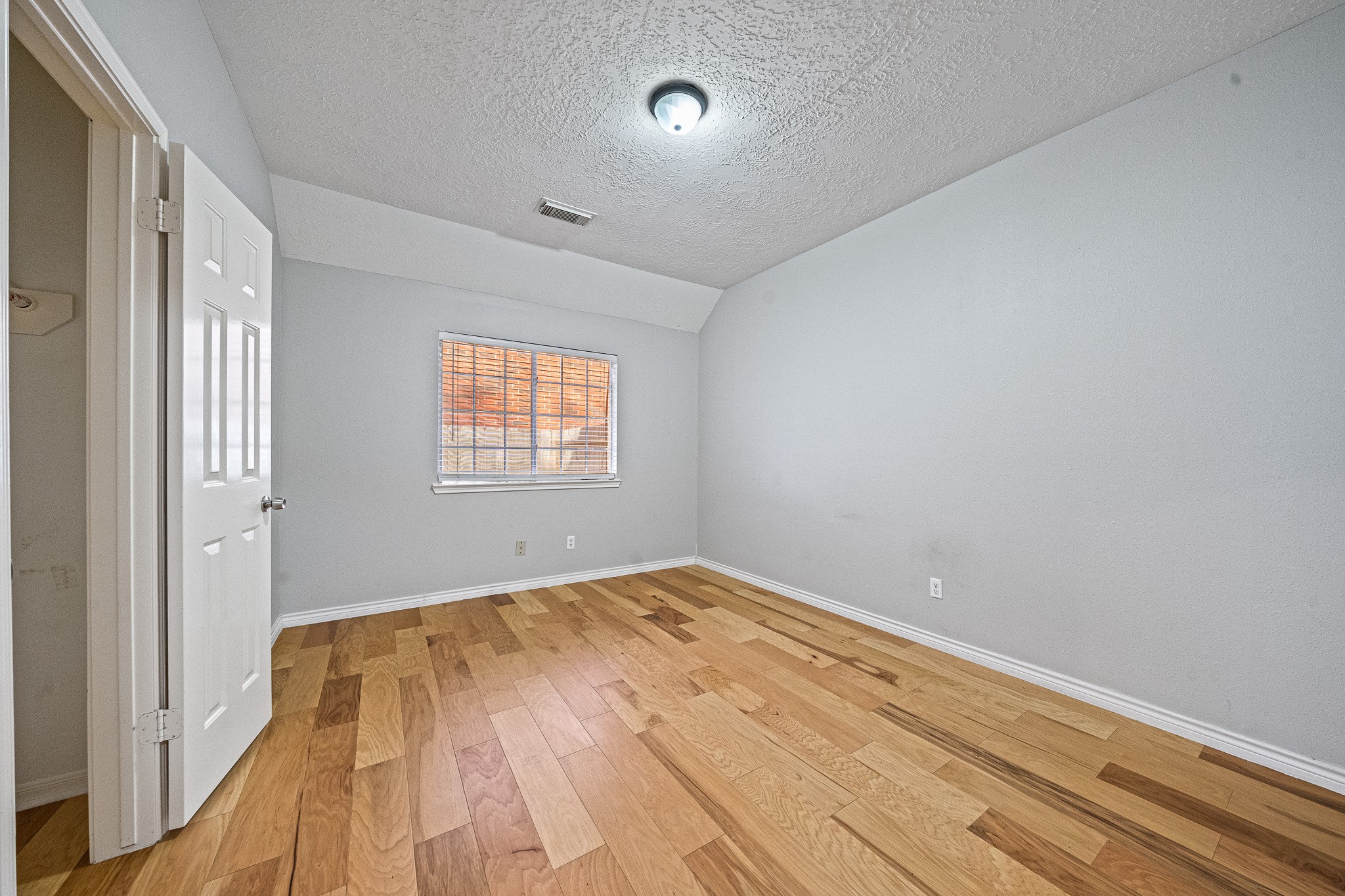 23223 Hazel Field Court Katy, TX 77494 - Photo 10 of 27 a view of empty room with wooden floor