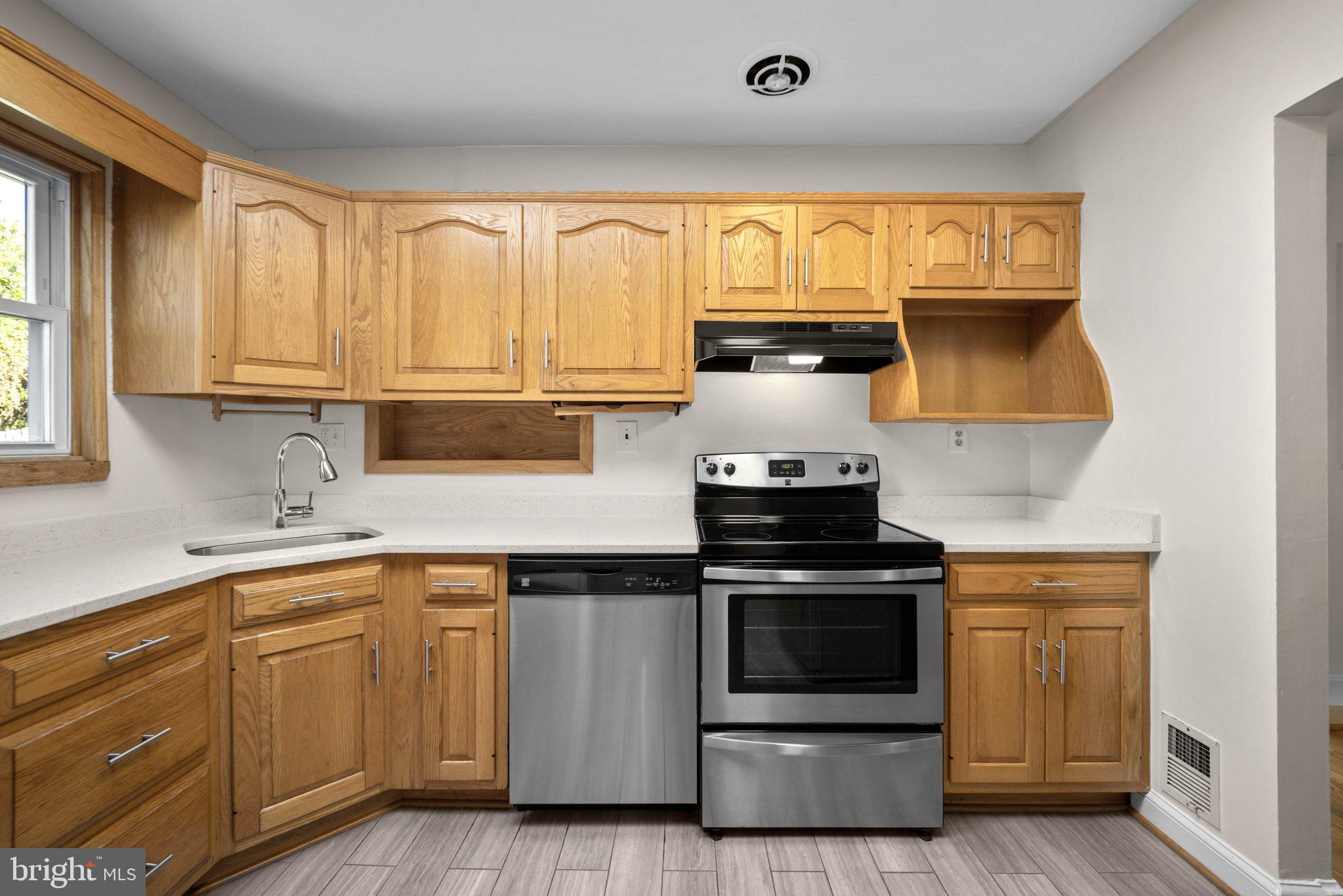 8412 Farrell Drive Chevy Chase, MD 20815 - Photo 12 of 45 Spacious Kitchen with stainless steel appliances