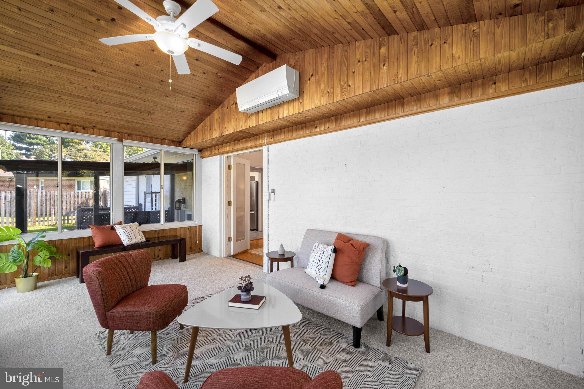8412 Farrell Drive Chevy Chase, MD 20815 - Photo 17 of 45 Sunroom with new wall-to-wall carpet