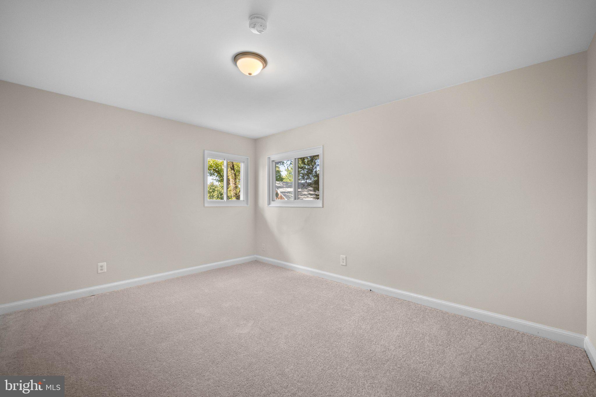 8412 Farrell Drive Chevy Chase, MD 20815 - Photo 25 of 45 Main Level Bedroom #1 with new wall-to-wall carpet