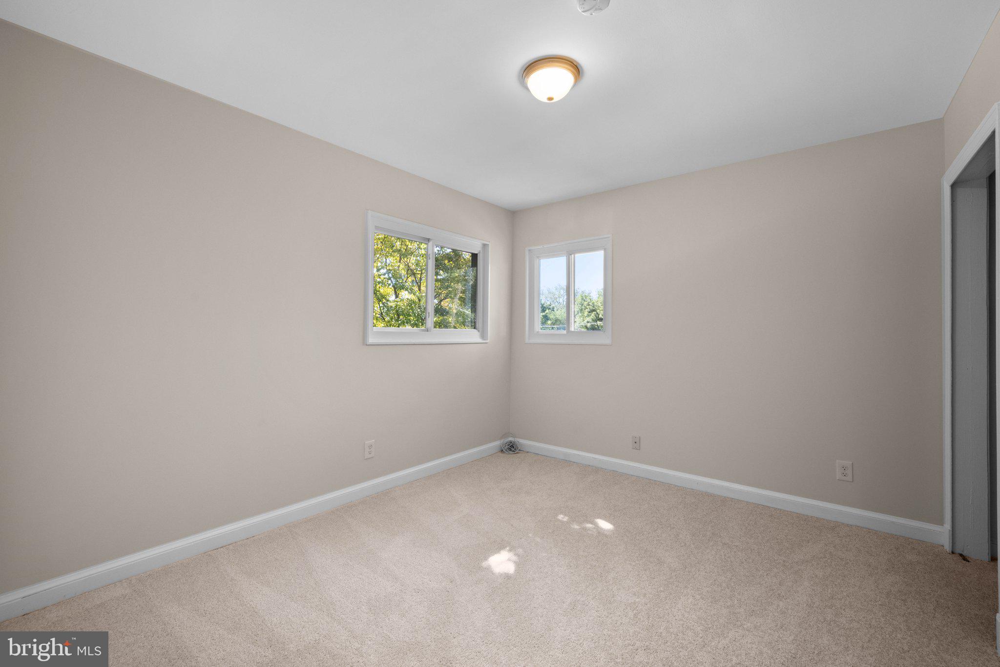 8412 Farrell Drive Chevy Chase, MD 20815 - Photo 29 of 45 Main Level Bedroom #2 with new wall-to-wall carpet