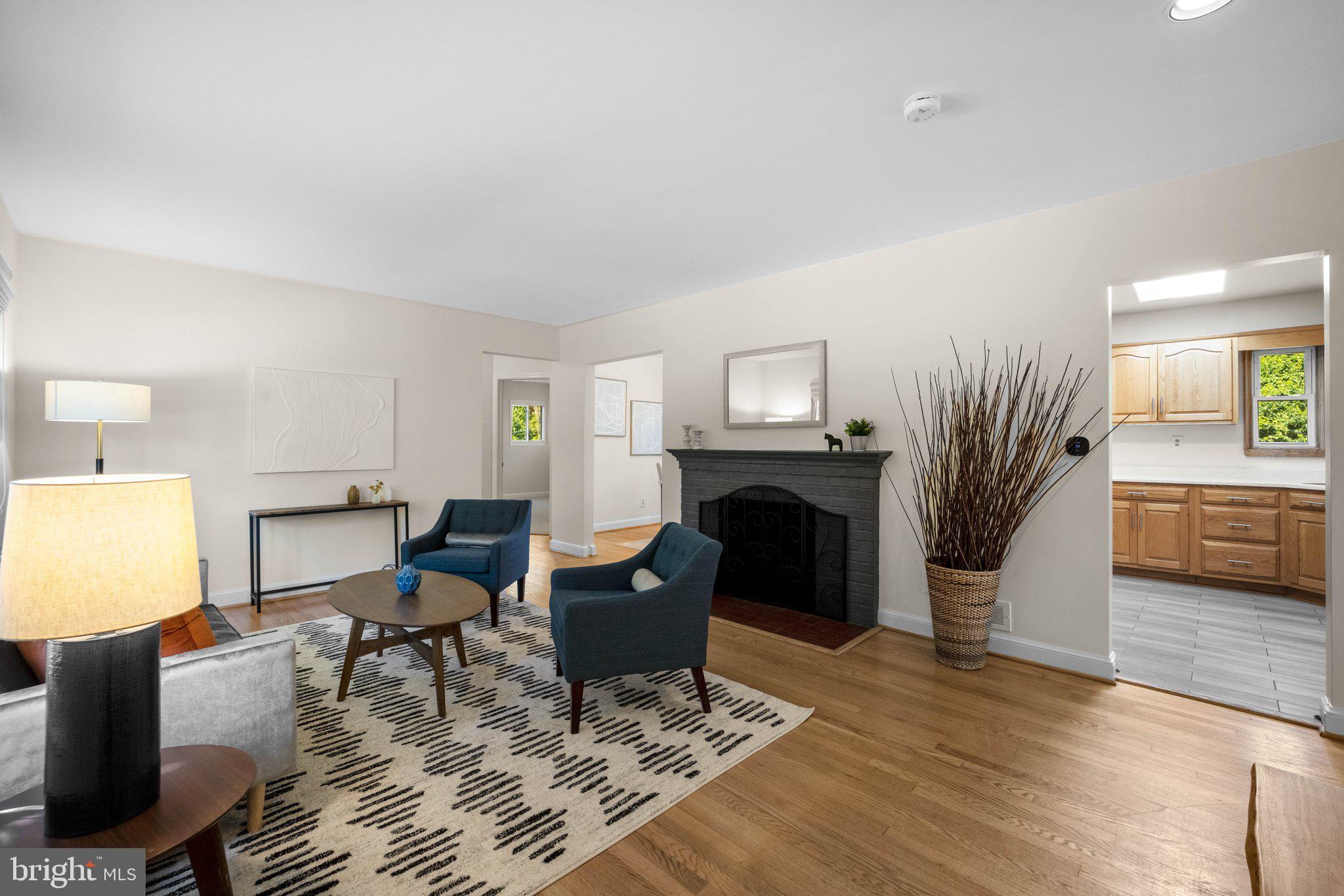 8412 Farrell Drive Chevy Chase, MD 20815 - Photo 6 of 45 Living Room with Wood Burning Fireplace