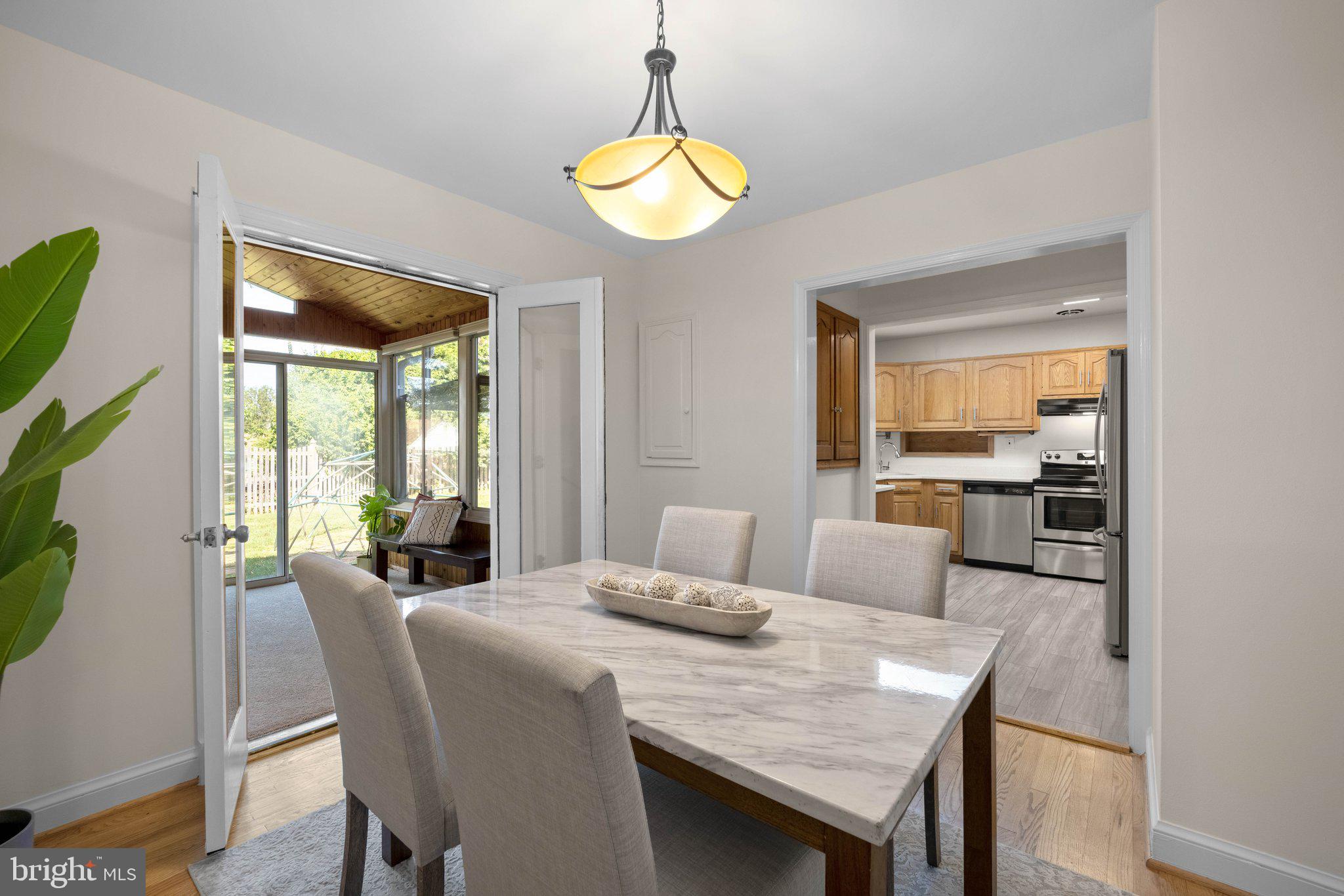 8412 Farrell Drive Chevy Chase, MD 20815 - Photo 10 of 45 Formal Dining Room that opens to Kitchen & Sunroom