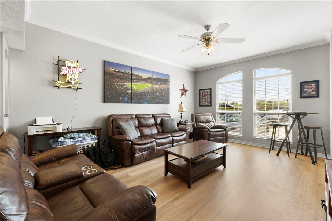 1198 Jones-Butler Road, Unit 3114 College Station, TX 77840 - Photo 2 of 13 a living room with furniture and a large window