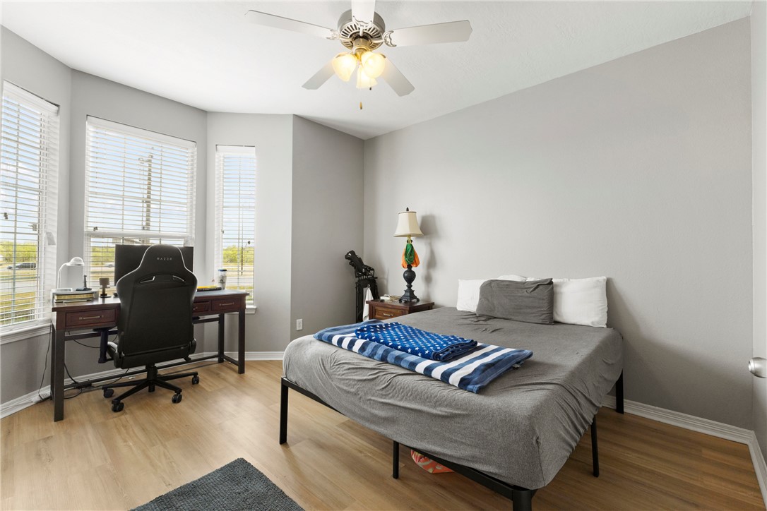 1198 Jones-Butler Road, Unit 3114 College Station, TX 77840 - Photo 6 of 13 a bedroom with a bed and a desk