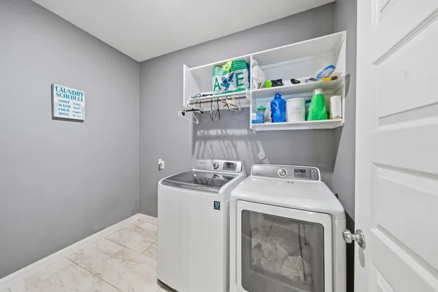 a view of a swimming pool with lounge chair