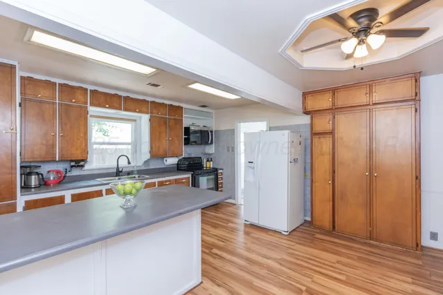 a view of a living room and hardwood floor
