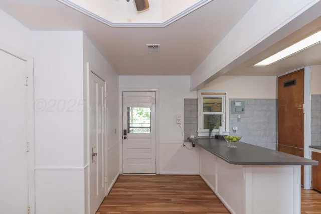 a view of a bathroom from the hallway