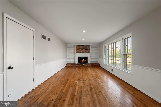 a living room with a fireplace